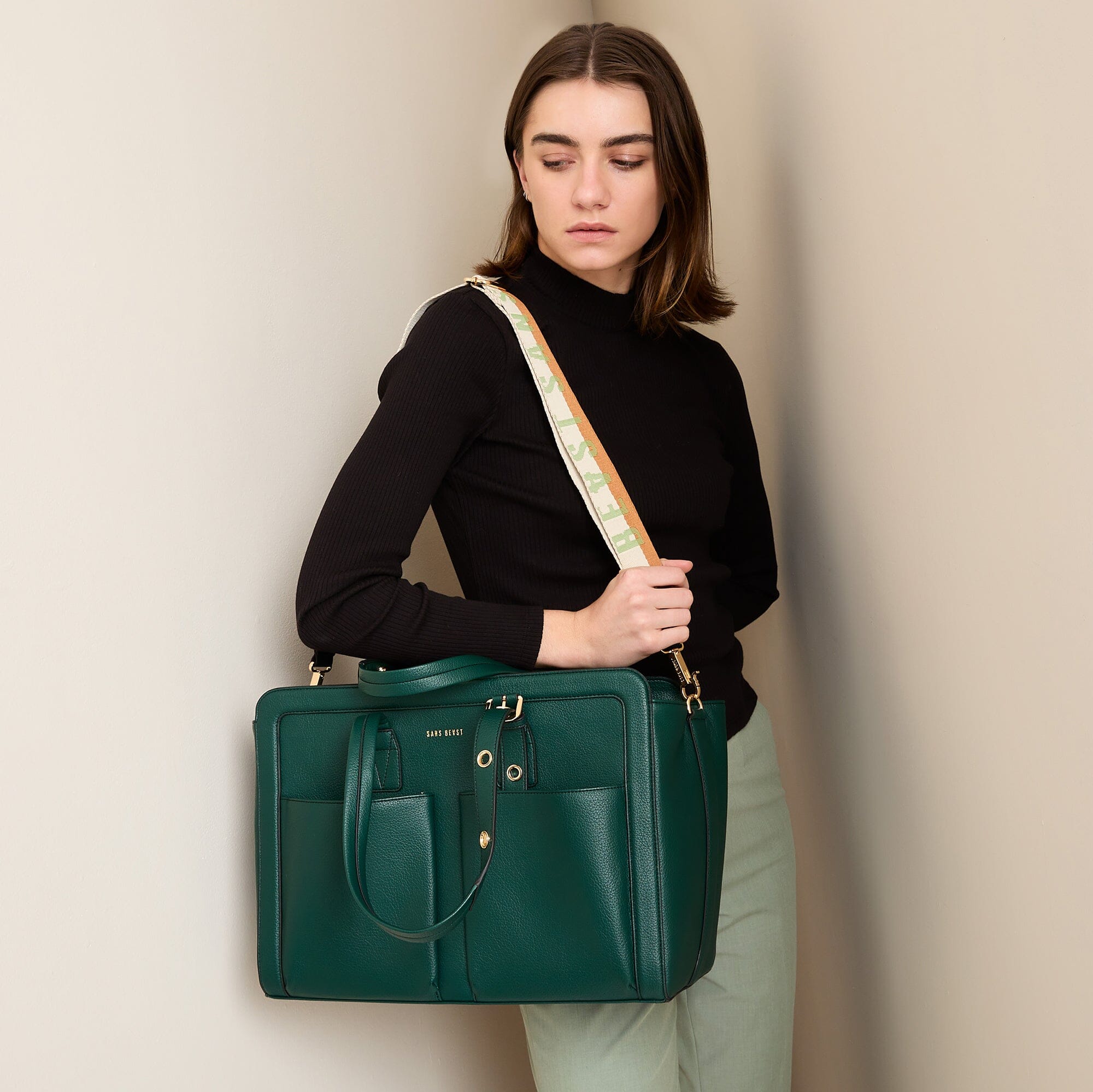 Daytripper Large Vegan Leather Tote Bag Forest Green worn on shoulder