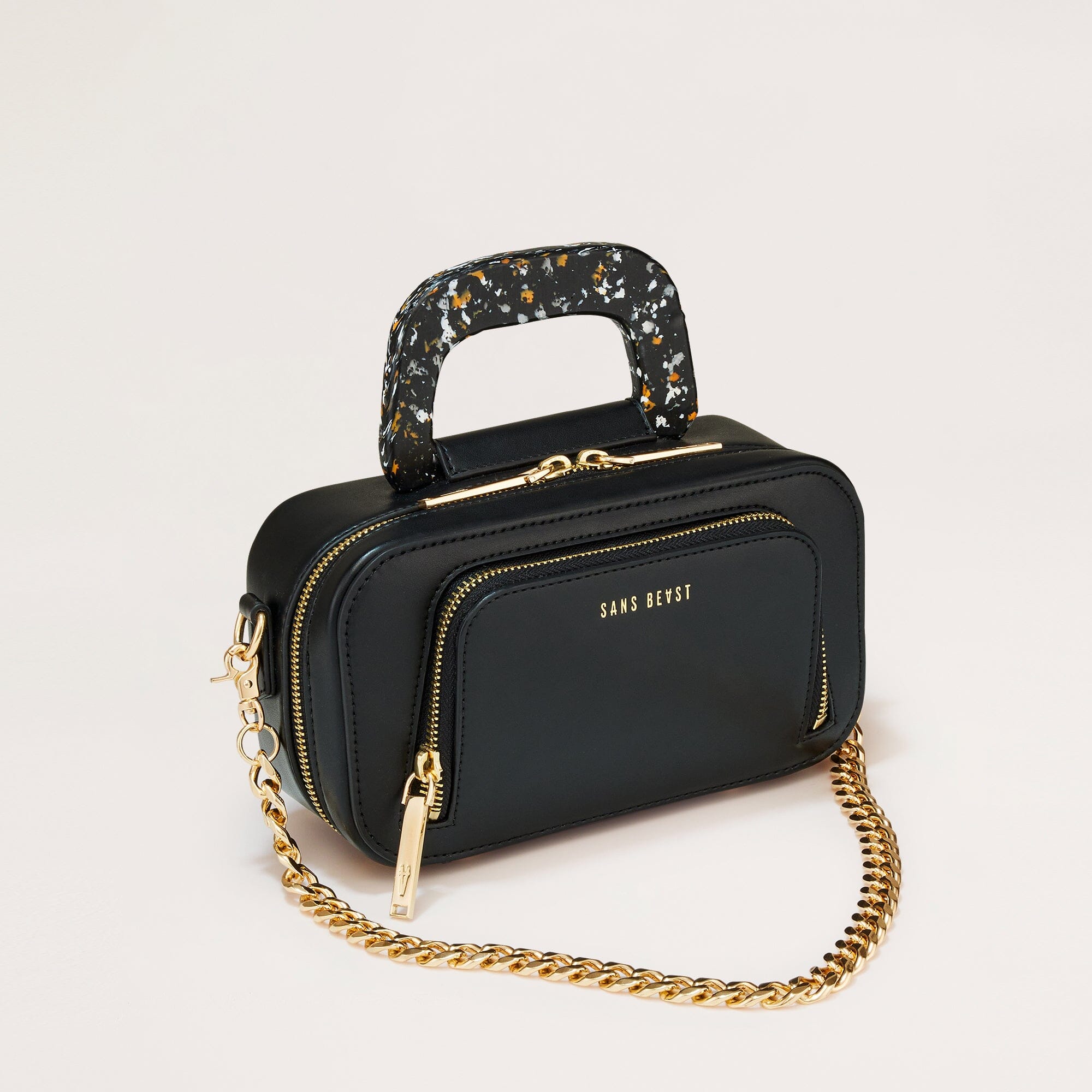 Petite Cosmos Vegan Crossbody Bag Black shown with included gold chain